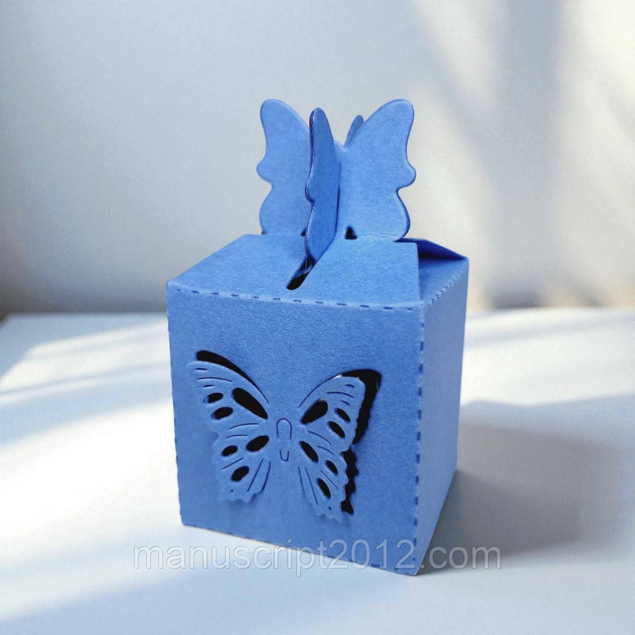 Коробка на 1 цукерку / бонбоньєрка "Метелик" (38х38х38мм.) блакитна
