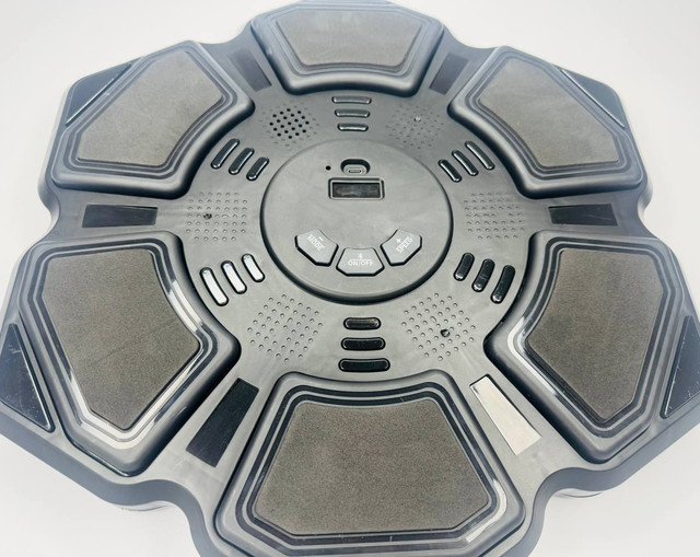 Тренажер для боксу на стіну