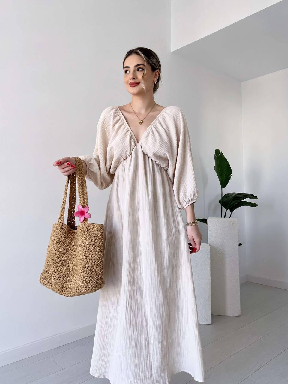 Світла бежева жіноча легка сукня з мусліну довжини міді із завищеною талією та довгим рукавом, фото 1