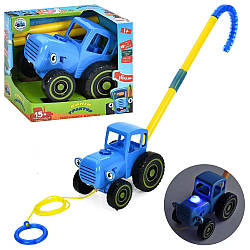 Музична каталка на паличці/на шнурі Синій трактор W6802-1A