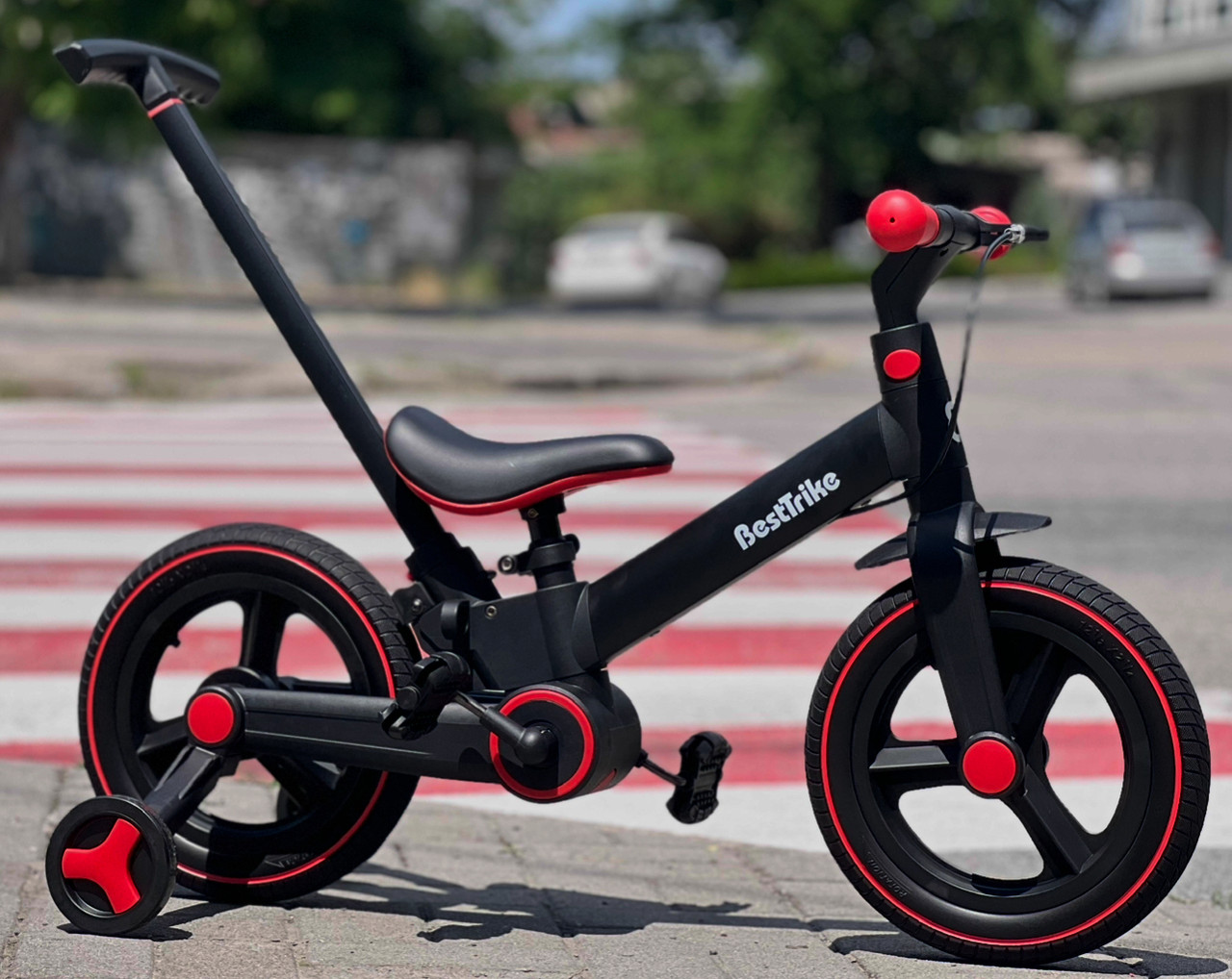 Велосипед з батьківською ручкою дитячий велосипед коляска 12" Best Trike 84119 чорно-червоний
