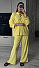 Жовтий жіночий трендовий літній костюм-двійка з креп жатки: сорочка на ґудзиках та широкі штани-кльош, фото 3