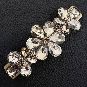 Шпилька автомат для волосся французький пластик квіточки з бежевими кристалами розмір 9 см висота 3 см