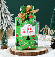 Пакет подарунковий зелений з малюнком новорічним з атласною стрічкою 23х14.5х3 см 1 шт для подарунків
