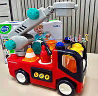 Машинка музична E 9998 (12/2) "Hola", звук, світло, колесо вільного ходу, в коробці