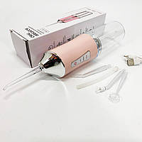 Іригатор для чищення зубів та порожнини рота Oral Irrigator з акумулятором та змінними насадками. Колір: рожевий