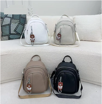 Жіночий рюкзак-сумка міський 28*23 см на блискавці з кишенею зі штучної шкіри в різних кольорах Fuerya