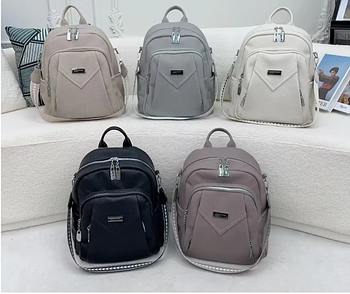 Жіночий рюкзак-сумка 37*29 см на блискавці з кишенями зі штучної шкіри в різних кольорах Fuerya