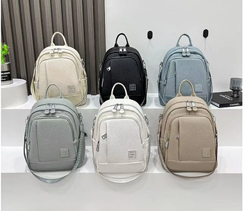 Жіночий рюкзак-сумка 35*28 см на блискавці з кишенями зі штучної шкіри в різних кольорах Fuerya