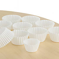 Білі паперові формочки для цукерок, горішків, зефіру, макаронс, тарталеток 30×24 мм (10 штук у наборі)