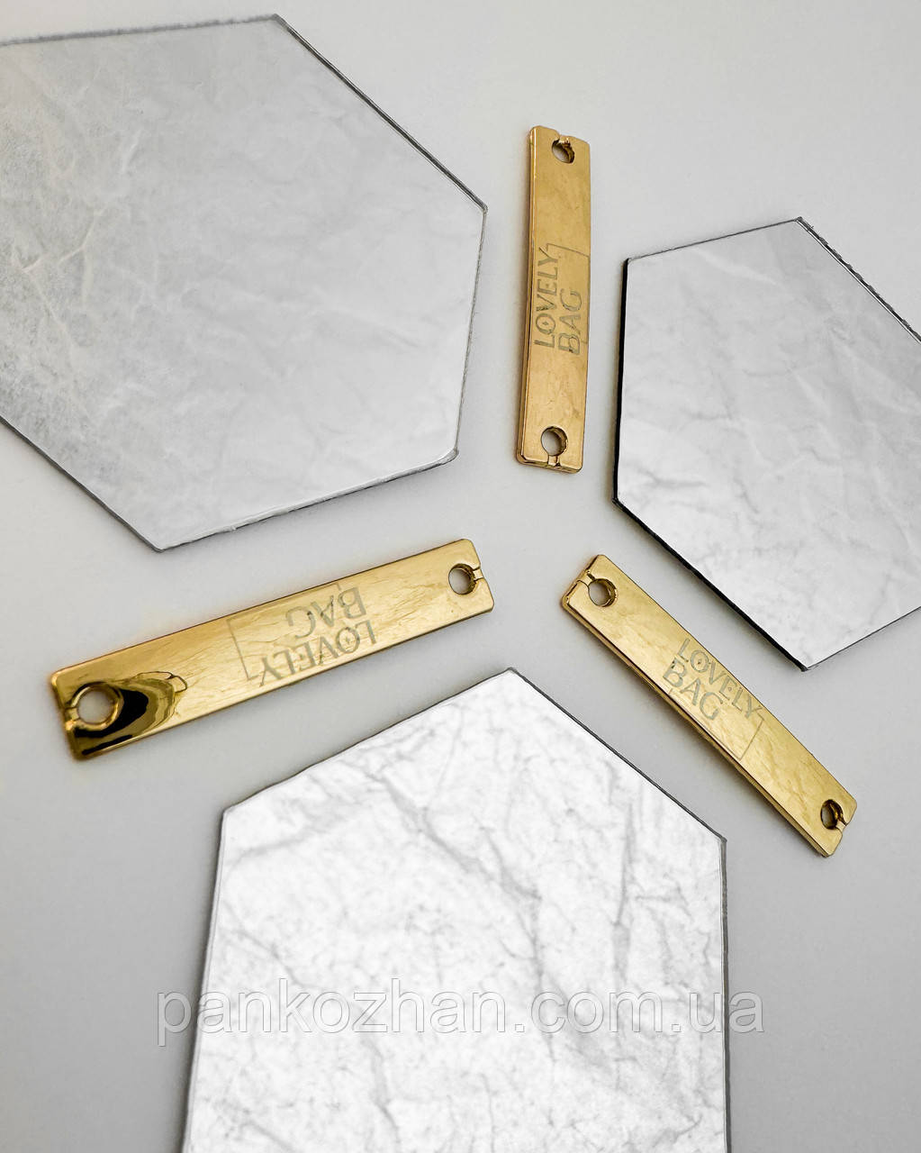 Металева бірка пришивна прямокутник 3.1*0.6 см з двома отворами золото, фото 1