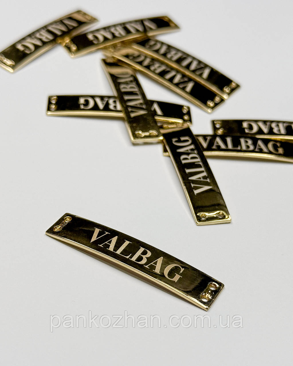 Металева бірка пришивна прямокутник 5*1.1 см з чотирма отворами золото, фото 1