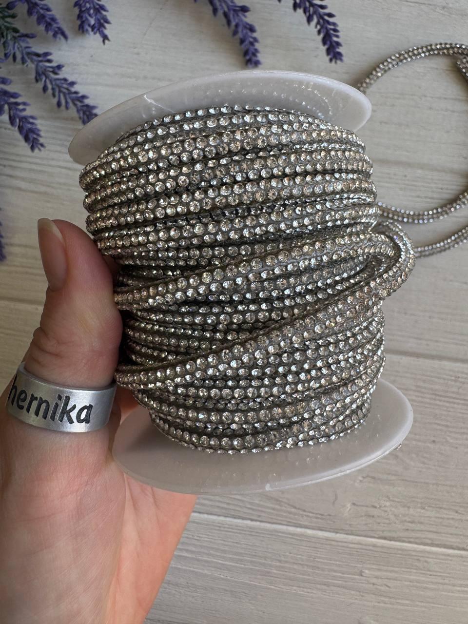 Шнур  стразовий силіконовий 4-5 мм , срібло 10 метрів