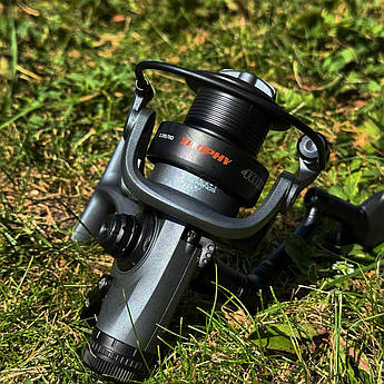 Фідерна котушка X-Fish Trophy Baitrunner 4000, безінерційна, передній фрикціон, 1+1BB, передаточне число 5.2:1, алюмінієва ручка,