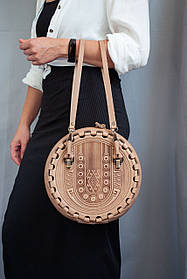 Кругла шкіряна сумка Берегиня темно-бежева, з короткими і довгим ремінцями