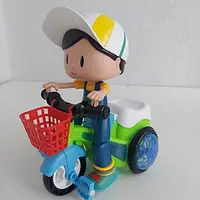 Музична іграшка хлопчик на велосипеді (мелодія, підсвічування, їздить, обертається, фігурка, у коробці) YJ 3023