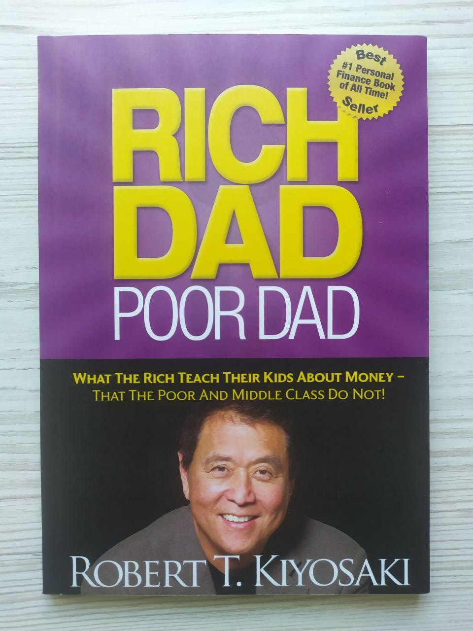 Pobert T. Kiyosaki. Rich Dad Poor Dad / Роберт Кійосакі. Багатий тато, бідний тато (АНГЛ), фото 1