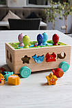Дерев'яна каталка-сортер 3в1 WToys 22995, фото 6