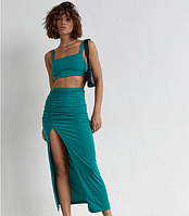 Літній жіночий костюм зі спідницею міді і топом зелений спідничний костюм розмір Л