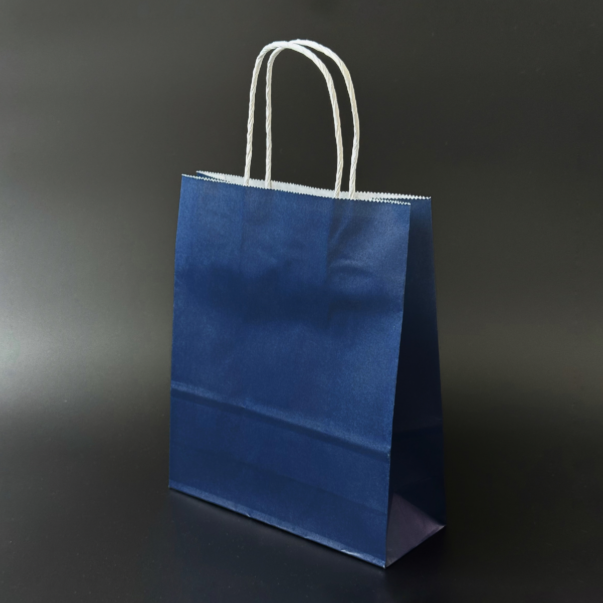 Пакет паперовий 20х8х24 см Синій з ручками 100 г/м, фото 1