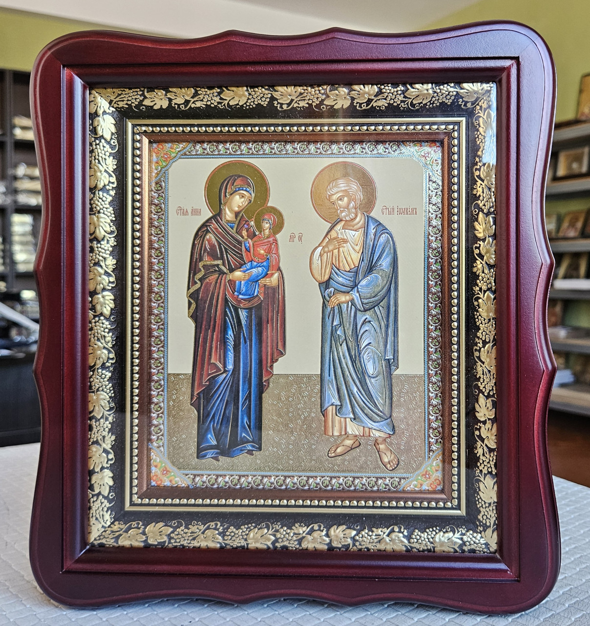 Ікона святих Іоаким та Аанна в темному дерев'яному фігурному кіоті під склом, розмір кіота 26×23, розмір ліку 15×18., фото 1