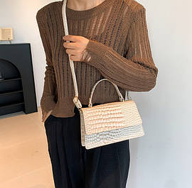 Жіночі сумочки і клатчі