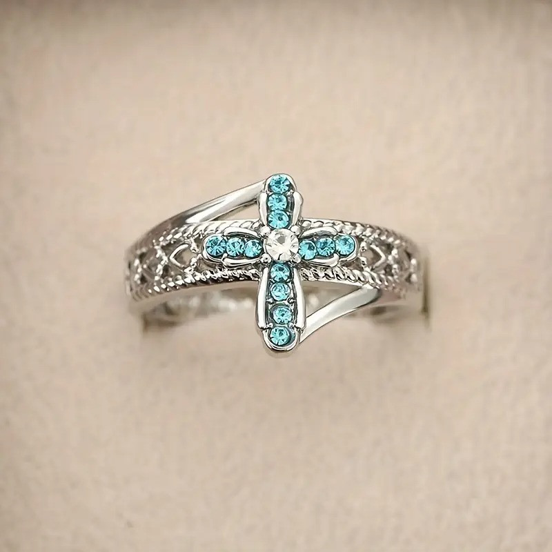 Сріблясте жіноче кільце у вигляді хреста з голубими кристалами 17 LuxAurum213, фото 1