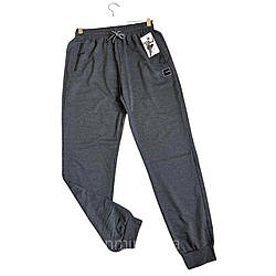 Чоловічі спортивні штани на манжеті всесезонні з кишенями  розміри від  L до 3XL