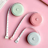 Сантиметрова стрічка для вимірювання на 1,5 м із кнопкою швидкого змотування в білому кольорі