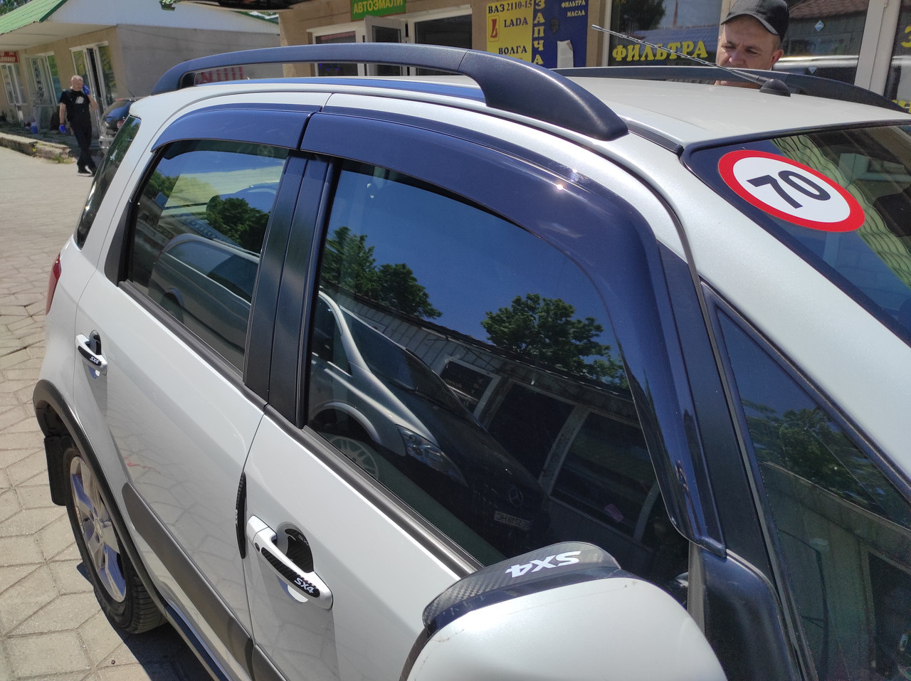 Дефлектори вікон (вітровики) Suzuki SX4 хетчбек 2006-2012 (ATM)