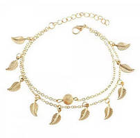 Браслет на ногу з підвісками золотистий