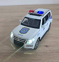 Машина металева поліція Mitsubishi Авто Експерт 1:32 світло звук 15*6*6,5см (51282), фото 5