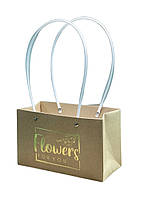 Сумка велика крафт з написом.