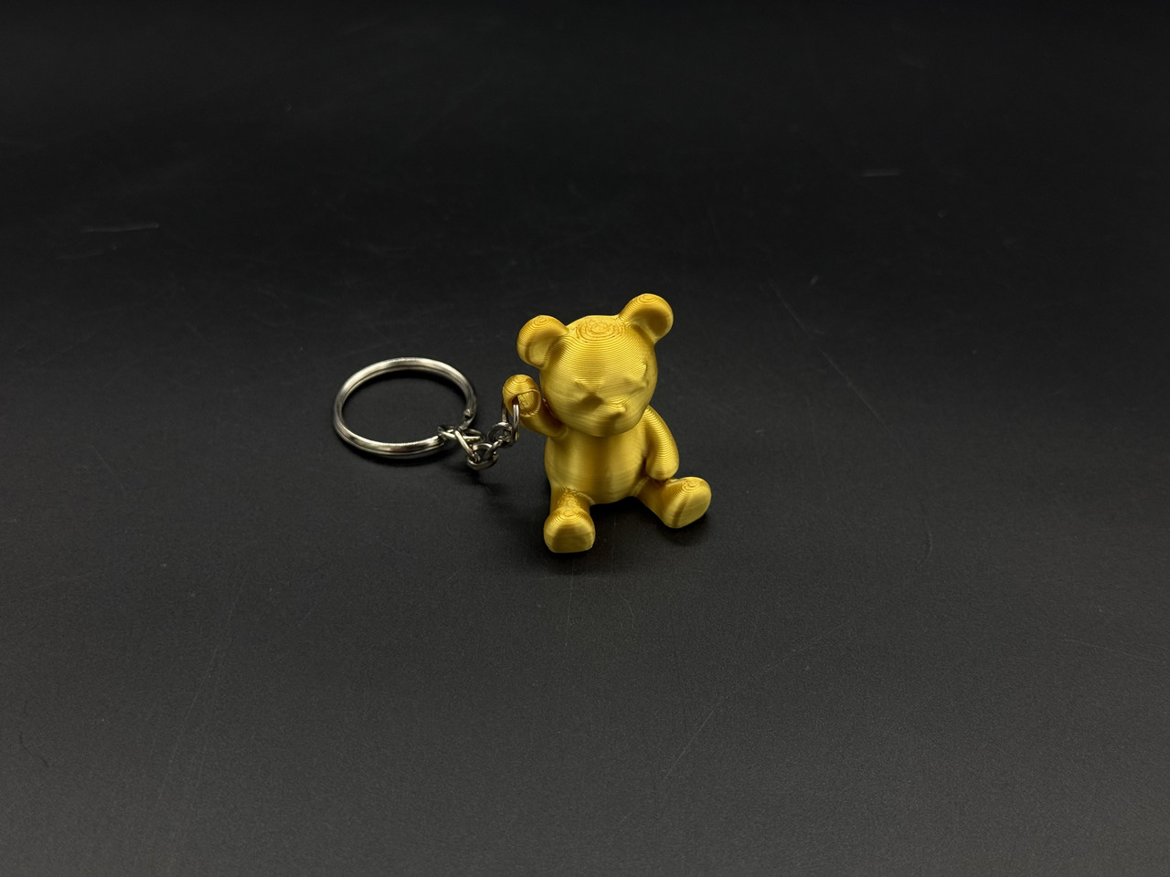 Брелок-підвіска для ключів сумки рюкзака 3D Ведмедик золотий. 33х28мм, фото 1