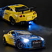 Моделька машини Nissan GTR R-35 оснащена світловими і звуковими ефектами, в маштабі 1:24, фото 7