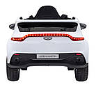 Дитяча акумуляторна машинка Aston Martin DBX Біла, фото 6