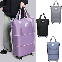 Дорожня сумка на колесах розкладна, легка містка міцна жіноча дорожня сумка на коліщатках