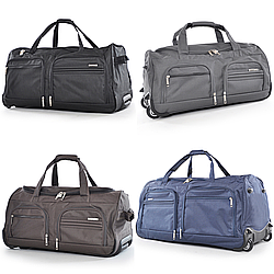 Дорожня сумка на колесах містка щільна з ручкою водонепроникна 70 літрів