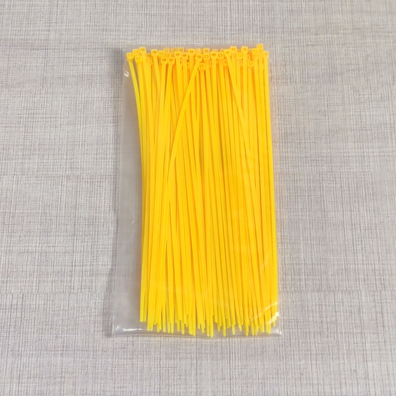 Стяжка кабельна "4х200" жовтий 100шт шир. 2,7мм довж. 200мм