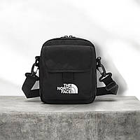 Стильна сумка з клапаном месенджер через плече / крос-боді The North Face, чорна