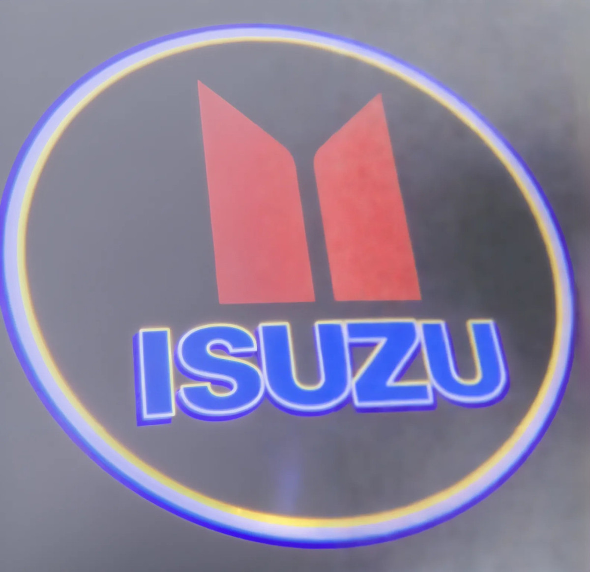 Картридж-вставка логотипу Isuzu на двері 1 шт (Завод), фото 1