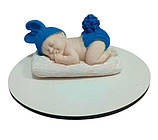 Шоколадна фігурка «Малюк на подушці» синя