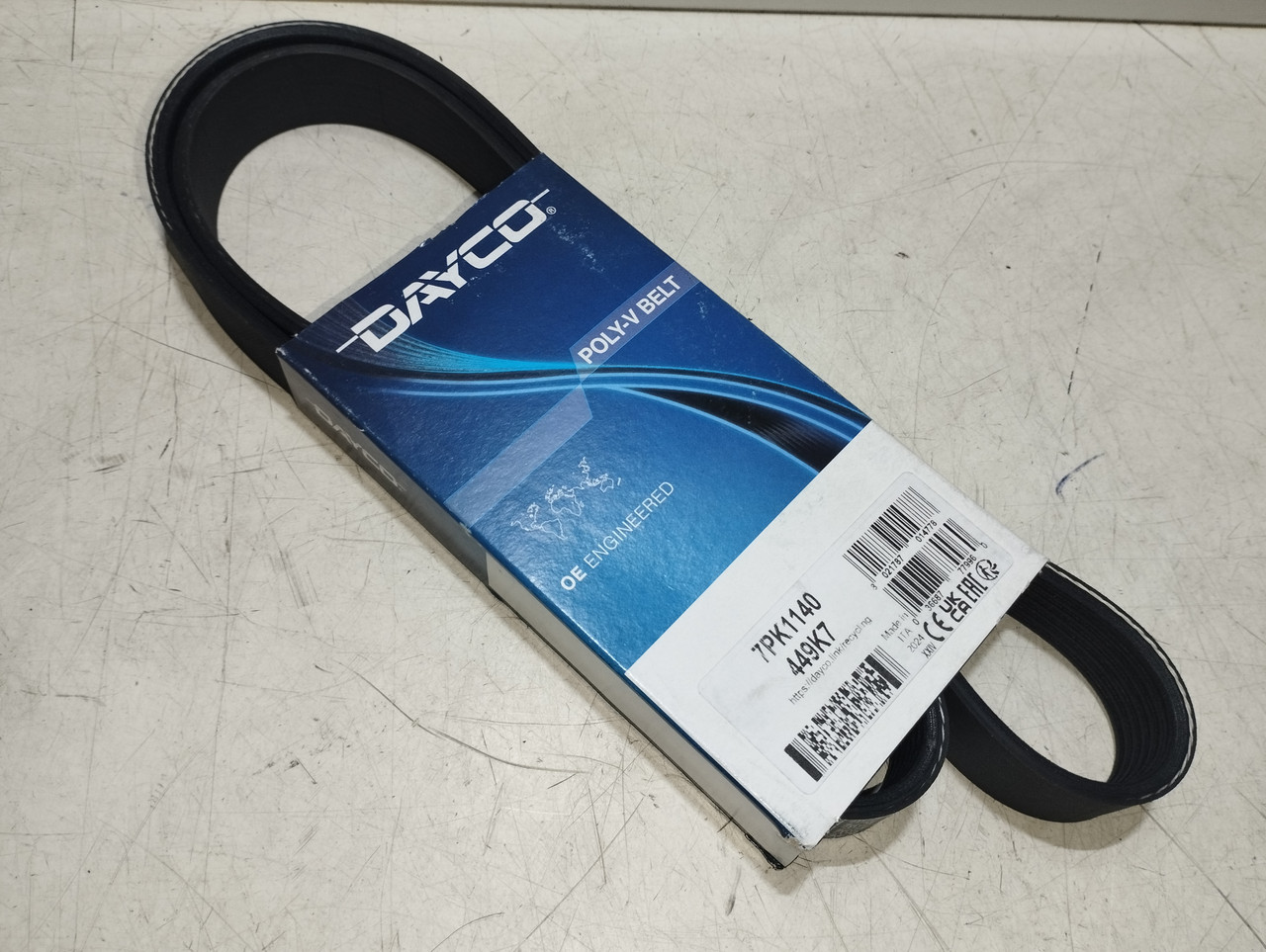 Ремінь полікліновий "Dayco" 7pk1140 NISSAN MICRA III/NOTE (E11, NE11) / TIIDA 1.6 л, фото 1