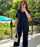 Літній трикотажний жіночий костюм з тунікою та широкими брюками синій брючний костюм для повних жінок 52-62