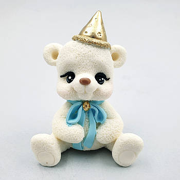 Шоколадна фігурка Ведмедик із блакитним бантиком у золотом ковпачку