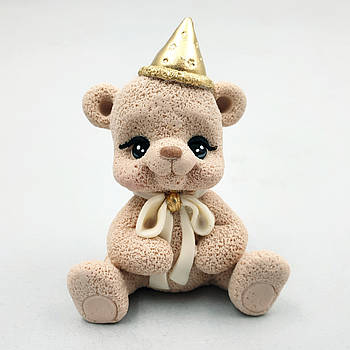 Шоколадна фігурка Ведмедик бежевий з бантиком у золотом ковпачку