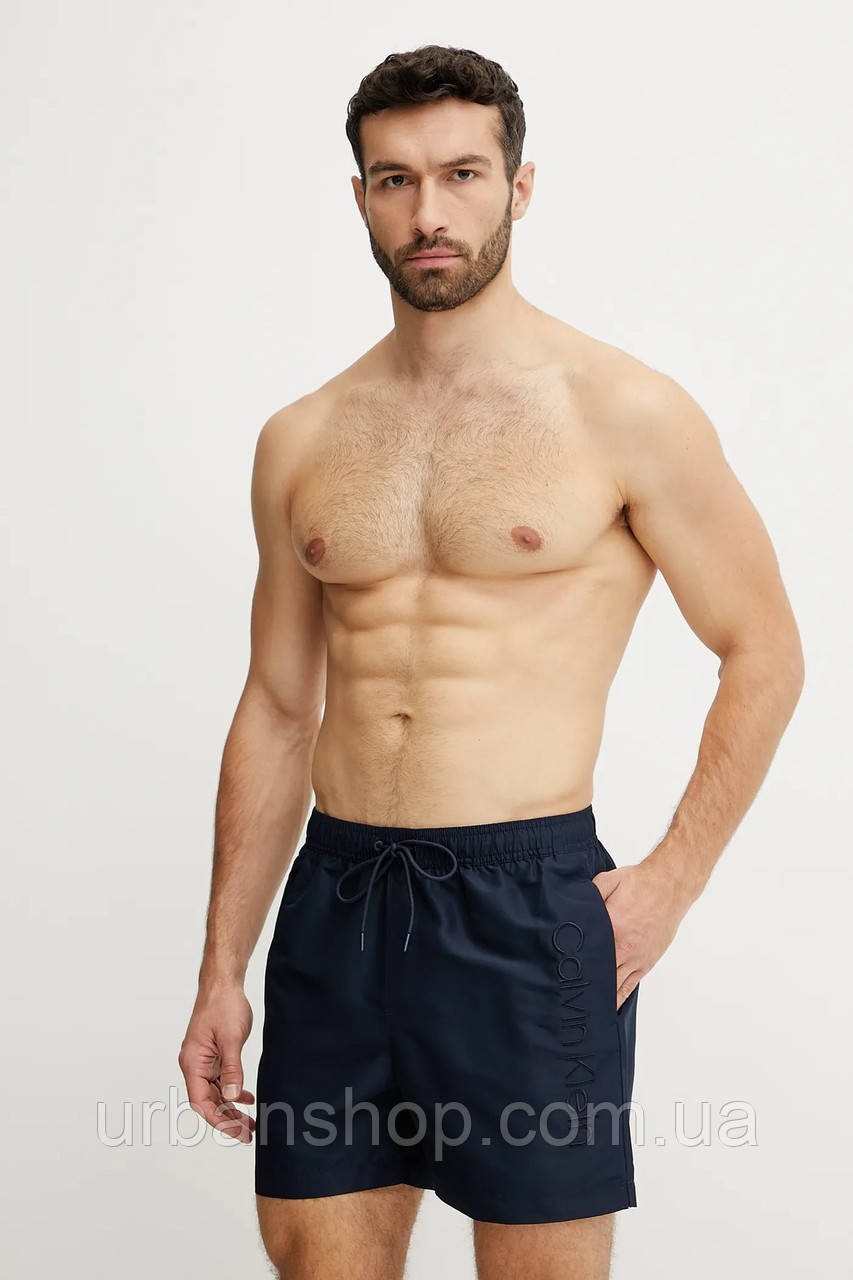 Urbanshop com ua Купальні шорти Calvin Klein колір синій KM0KM01166 РОЗМІРИ ЗАПИТУЙТЕ