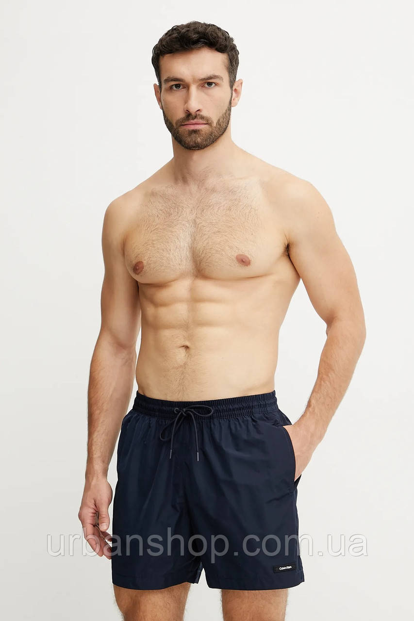 Urbanshop com ua Купальні шорти Calvin Klein колір синій KM0KM01111 РОЗМІРИ ЗАПИТУЙТЕ