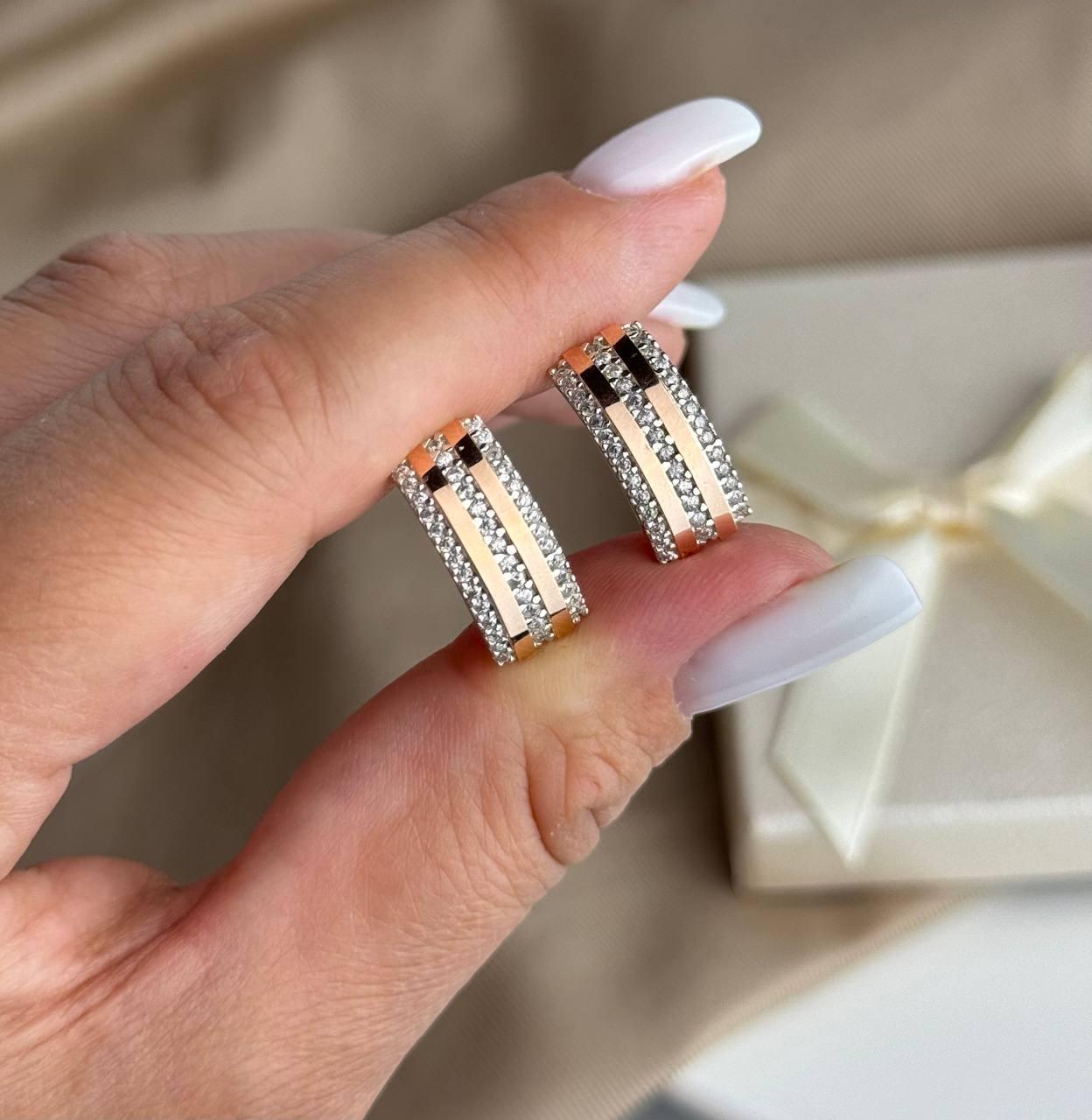 Срібні сережки з золотими вставками