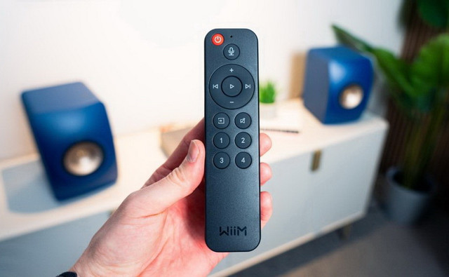 WiiM_Amp_Amplifier_Lifestyle_Remote-1024x576.jpg